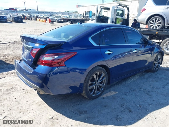 2018 Nissan Altima 2.5 SL with VIN 1N4AL3AP1JC294068, listed as a IAAI auction lot 41639471 with 100,772 mi miles. Bid and sale history available at carsss.com. Image 4.