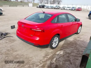 2017 Ford Focus SE with VIN 1FADP3F29HL299463, listed as a IAAI auction lot 41967179 with 84,376 mi miles and . Bid and sale history available at DreamBid. Image 4.