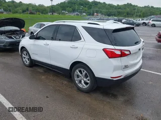 2021 Chevrolet Equinox Premier with VIN 3GNAXNEV5MS160043, listed as a IAAI auction lot 42109564 with 36,808 mi miles and . Bid and sale history available at DreamBid. Image 3.