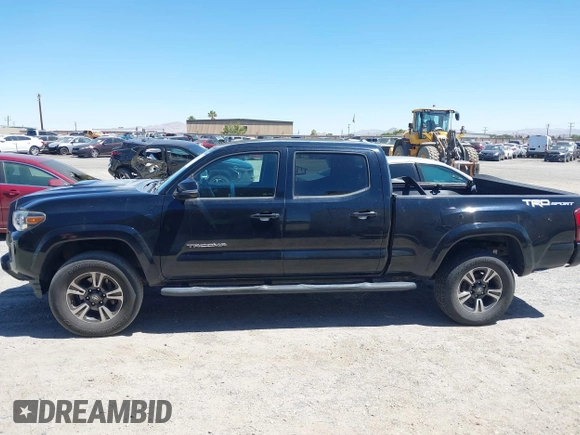 2018 Toyota Tacoma SR5 with VIN 3TMBZ5DN1JM014540, listed as a IAAI auction lot 42505324 with 112,990 mi miles and . Bid and sale history available at DreamBid. Image 14.