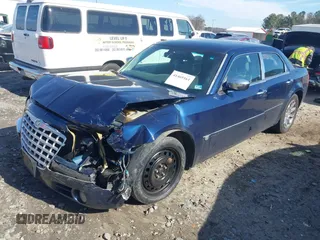 2005 Chrysler 300 with VIN 2C3JA63HX5H654114, listed as a IAAI auction lot 41469161 with 136,104 mi miles. Bid and sale history available at carsss.com. Image 18.