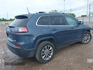 2021 Jeep Cherokee Latitude Lux with VIN 1C4PJLMX2MD107165, listed as a IAAI auction lot 42456893 with 62,625 mi miles and . Bid and sale history available at DreamBid. Image 4.