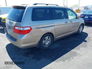 2007 Honda Odyssey EX z VIN 5FNRL38407B123509, wystawiony jako IAAI lot #42238353 z przebiegiem 200 111 mil mil oraz . Historia ofert i sprzedaży dostępna na DreamBid. Obrazek 4.