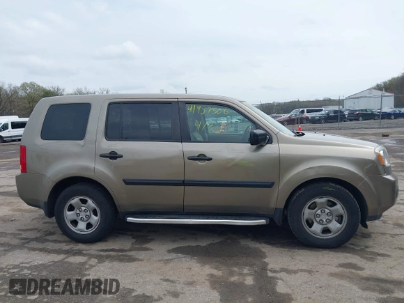 2011 Honda Pilot LX z VIN 5FNYF4H21BB103169, wystawiony jako IAAI lot #41957506 z przebiegiem 124 150 mil mil oraz . Historia ofert i sprzedaży dostępna na DreamBid. Obrazek 13.