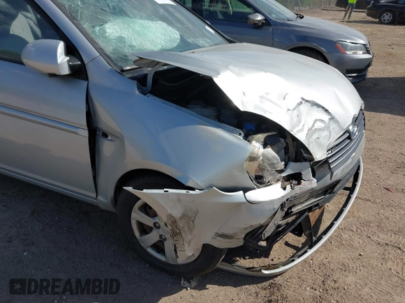 2009 Hyundai Accent Auto GLS z VIN KMHCN46C69U326197, wystawiony jako IAAI lot #42268198 z przebiegiem 74 308 mil mil oraz . Historia ofert i sprzedaży dostępna na DreamBid. Obrazek 17.