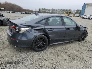 2023 Honda Civic Sport z VIN 2HGFE2F50PH556908, wystawiony jako Copart lot #52789655 z przebiegiem Nie podano mil oraz Szkoda całkowita • Salvage title. Historia ofert i sprzedaży dostępna na DreamBid. Obrazek 3.