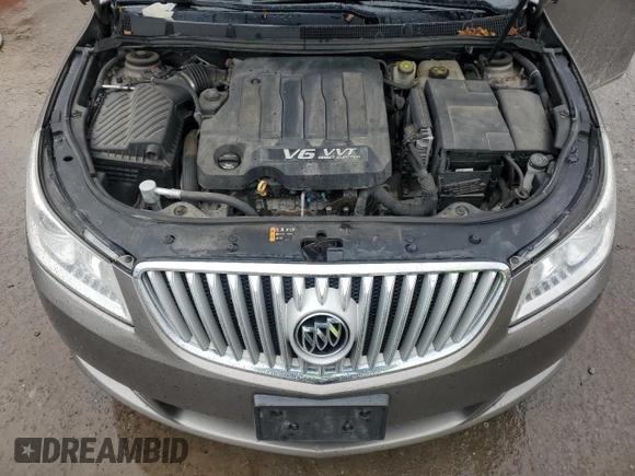 2012 Buick LaCrosse Premium 2 z VIN 1G4GF5E3XCF353906, wystawiony jako Copart lot #57954945 z przebiegiem 110 484 mil mil oraz Szkoda całkowita • Salvage title. Historia ofert i sprzedaży dostępna na DreamBid. Obrazek 11.