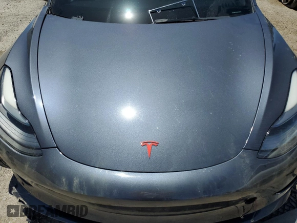 2022 Tesla Model 3 Long Range z VIN 5YJ3E1EBXNF263832, wystawiony jako Copart lot #57177445 z przebiegiem Nie podano mil oraz Szkoda całkowita • Salvage title. Historia ofert i sprzedaży dostępna na DreamBid. Obrazek 11.