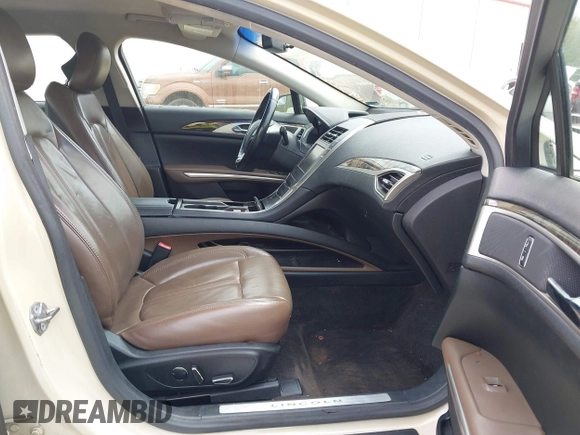 2015 Lincoln MKZ Hybrid with VIN 3LN6L2LU2FR623121, listed as a IAAI auction lot 41970272 with 209,510 mi miles. Bid and sale history available at carsss.com. Image 5.