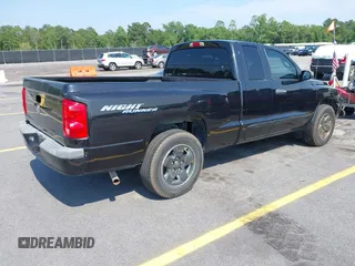 2006 Dodge Dakota SLT z VIN 1D7HE42NX6S666354, wystawiony jako IAAI lot #42394779 z przebiegiem 124 633 mil mil oraz . Historia ofert i sprzedaży dostępna na DreamBid. Obrazek 4.