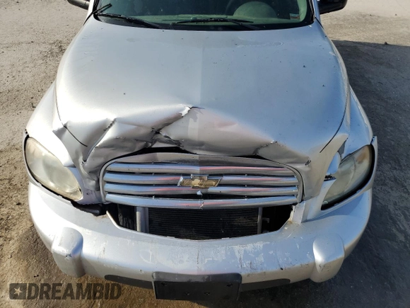 2010 Chevrolet HHR LS z VIN 3GNBAADB7AS526523, wystawiony jako Copart lot #55795115 z przebiegiem 165 927 mil mil oraz Szkoda całkowita • Salvage title. Historia ofert i sprzedaży dostępna na DreamBid. Obrazek 12.