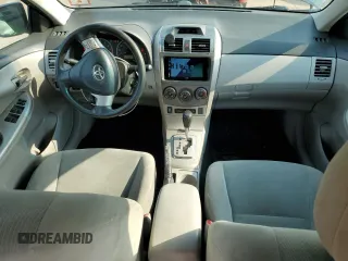 2012 Toyota Corolla L z VIN 2T1BU4EE2CC784314, wystawiony jako Copart lot #57239015 z przebiegiem 168 527 mil mil oraz Szkoda całkowita • Salvage title. Historia ofert i sprzedaży dostępna na DreamBid. Obrazek 8.