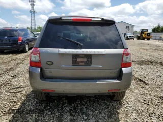 2010 Land Rover LR2 HSE with VIN SALFR2BN5AH191866, listed as a Copart auction lot 60617335 with 154,409 mi miles and Salvage title. Bid and sale history available at DreamBid. Image 6.