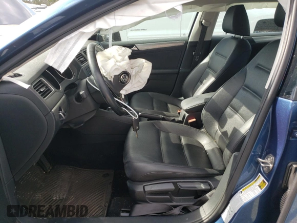 2015 Volkswagen Jetta Sedan 1.8T SE w/Connectivity with VIN 3VWD07AJ8FM267200, listed as a Copart auction lot 73553834 with 87,675 mi miles and Salvage Title. Bid and sale history available at carsss.com. Image 7.