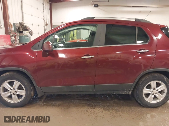 2017 Chevrolet Trax LT with VIN 3GNCJLSBXHL223940, listed as a IAAI auction lot 41998080 with 121,448 mi miles and . Bid and sale history available at carsss.com. Image 14.