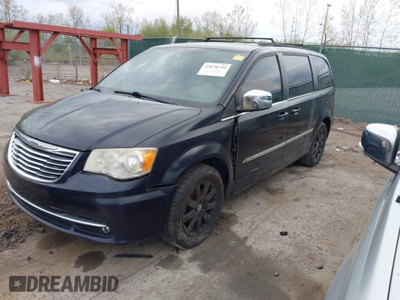 2011 Chrysler Town & Country Touring L with VIN 2A4RR8DG8BR645498, listed as a IAAI auction lot 42070744 with 173,661 mi miles and . Bid and sale history available at carsss.com. Image 2.