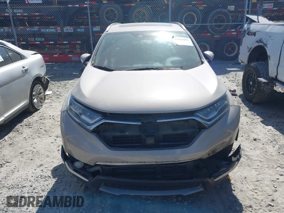 2018 Honda CR-V Touring with VIN 5J6RW1H98JL000031, listed as a IAAI auction lot 40605651 with 129,516 mi miles and . Bid and sale history available at DreamBid. Image 11.