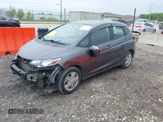 2019 Honda Fit LX z VIN 3HGGK5H40KM707419, wystawiony jako IAAI lot #42354063 z przebiegiem 48 197 mil mil oraz . Historia ofert i sprzedaży dostępna na DreamBid. Obrazek 17.