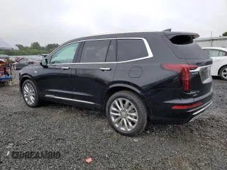 2023 Cadillac XT6 AWD Premium Luxury with VIN 1GYKPFRS0PZ100482, listed as a Copart auction lot 66685134 with 22,974 mi miles and Salvage Title. Bid and sale history available at carsss.com. Image 2.