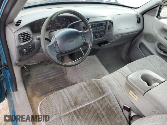 1998 Ford F-150 z VIN 1FTDF17W2WNA09312, wystawiony jako Copart lot #48290845 z przebiegiem 167 417 mil mil oraz Szkoda całkowita • Salvage title. Historia ofert i sprzedaży dostępna na DreamBid. Obrazek 8.