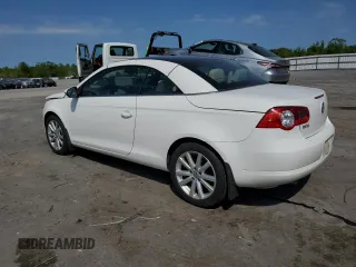 2011 Volkswagen Eos with VIN WVWAW7AH7BV003659, listed as a Copart auction lot 52494904 with 122,927 mi miles and Salvage Title. Bid and sale history available at DreamBid. Image 2.