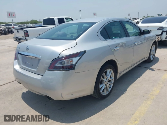 2014 Nissan Maxima SV with VIN 1N4AA5AP5EC464620, listed as a IAAI auction lot 42267412 with 147,129 mi miles and . Bid and sale history available at DreamBid. Image 4.