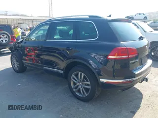 2016 Volkswagen Touareg Sport with VIN WVGEF9BP7GD010252, listed as a IAAI auction lot 42465165 with Not provided miles and . Bid and sale history available at DreamBid. Image 3.