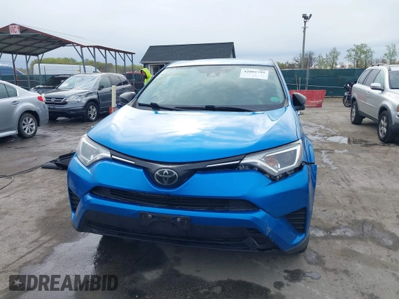 2018 Toyota RAV4 LE with VIN JTMBFREV8JJ220630, listed as a IAAI auction lot 42001795 with 86,027 mi miles. Bid and sale history available at carsss.com. Image 12.