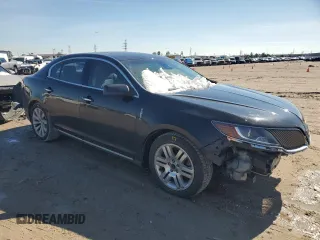 2014 Lincoln MKS z VIN 1LNHL9DK3EG606655, wystawiony jako Copart lot #42008655 z przebiegiem 100 886 mil mil oraz Szkoda całkowita • Salvage title. Historia ofert i sprzedaży dostępna na DreamBid. Obrazek 4.