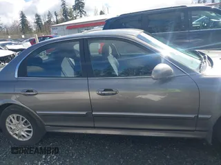 2004 Hyundai Sonata with VIN KMHWF25SX4A963868, listed as a IAAI auction lot 41973317 with 191,843 mi miles. Bid and sale history available at carsss.com. Image 13.