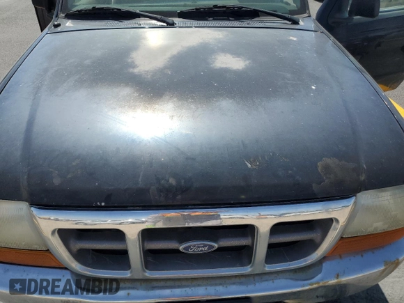 1999 Ford Ranger XLT z VIN 1FTZR15X9XPA87648, wystawiony jako Copart lot #57686645 z przebiegiem 254 120 mil mil oraz Czysty tytuł • Clean title. Historia ofert i sprzedaży dostępna na DreamBid. Obrazek 11.