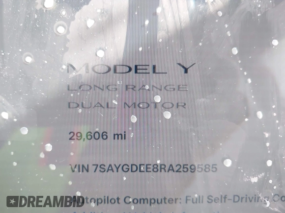 2024 Tesla Model Y Long Range with VIN 7SAYGDEE8RA259585, listed as a IAAI auction lot 41763296 with 29,606 mi miles. Bid and sale history available at carsss.com. Image 7.