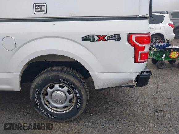 2018 Ford F-150 XL with VIN 1FTMF1EB1JKE19030, listed as a IAAI auction lot 42233745 with 193,352 mi miles and . Bid and sale history available at DreamBid. Image 17.