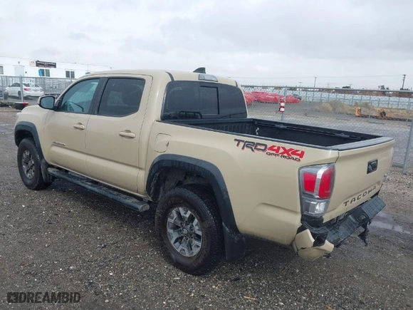 2020 Toyota Tacoma 4WD SR5 with VIN 3TMCZ5AN0LM340440, listed as a IAAI auction lot 41576373 with 98,843 mi miles. Bid and sale history available at carsss.com. Image 3.