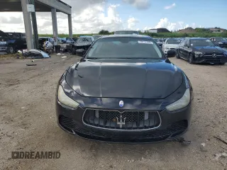2015 Maserati Ghibli with VIN ZAM57XSA2F1129792, listed as a Copart auction lot 70717393 with 116,851 mi miles. Bid and sale history available at carsss.com. Image 5.
