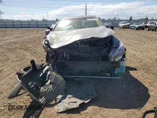 2014 Infiniti Q50 Premium with VIN JN1BV7AR8EM682225, listed as a Copart auction lot 56753125 with 121,000 mi miles and Salvage title. Bid and sale history available at DreamBid. Image 5.