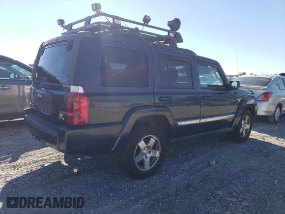 2010 Jeep Commander Sport z VIN 1J4RG4GT8AC139104, wystawiony jako Copart lot #84720134 z przebiegiem 167 646 mil mil oraz Szkoda całkowita • Salvage title. Historia ofert i sprzedaży dostępna na DreamBid. Obrazek 3.