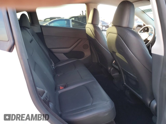 2023 Tesla Model Y Long Range with VIN 7SAYGDEE9PA129876, listed as a Copart auction lot 41819605 with 36,110 mi miles and Salvage Title. Bid and sale history available at DreamBid. Image 10.