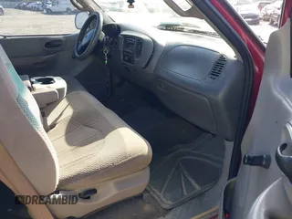 2000 Ford F-150 XL with VIN 1FTZX1729YNC32076, listed as a IAAI auction lot 41523364 with 216,726 mi miles. Bid and sale history available at carsss.com. Image 5.