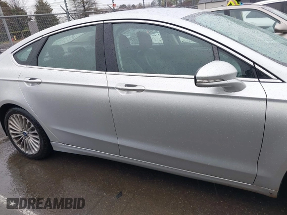 2016 Ford Fusion Titanium with VIN 3FA6P0K91GR360914, listed as a IAAI auction lot 41833665 with 107,367 mi miles and . Bid and sale history available at DreamBid. Image 13.
