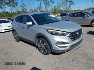 2016 Hyundai Tucson Sport with VIN KM8J33A25GU224084, listed as a IAAI auction lot 41827851 with 153,348 mi miles. Bid and sale history available at carsss.com. Image 1.