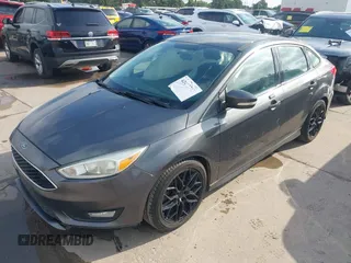 2016 Ford Focus SE z VIN 1FADP3F28GL360512, wystawiony jako IAAI lot #42427723 z przebiegiem 217 172 mil mil oraz . Historia ofert i sprzedaży dostępna na DreamBid. Obrazek 17.