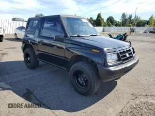 1998 Chevrolet Tracker z VIN 2CNBJ1868W6925819, wystawiony jako Copart lot #70881874 z przebiegiem 180 849 mil mil oraz Szkoda całkowita • Salvage title. Historia ofert i sprzedaży dostępna na DreamBid. Obrazek 4.
