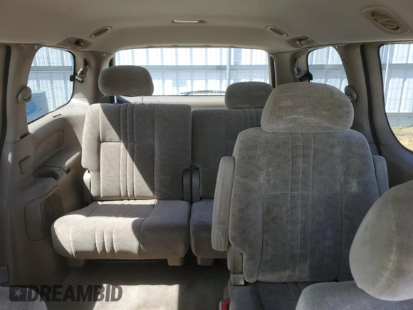 2001 Toyota Sienna LE z VIN 4T3ZF13C01U340313, wystawiony jako Copart lot #57176485 z przebiegiem 137 449 mil mil oraz Szkoda całkowita • Salvage title. Historia ofert i sprzedaży dostępna na DreamBid. Obrazek 10.