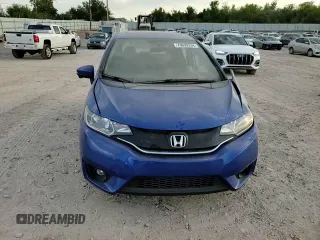 2017 Honda Fit EX-L with VIN JHMGK5H99HS018102, listed as a Copart auction lot 75699334 with Not provided miles and Salvage title. Bid and sale history available at DreamBid. Image 11.