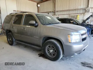 2012 Chevrolet Tahoe LS z VIN 1GNSCAE06CR318744, wystawiony jako Copart lot #46444455 z przebiegiem 194 651 mil mil oraz Czysty tytuł • Clean title. Historia ofert i sprzedaży dostępna na DreamBid. Obrazek 4.