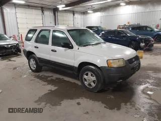 2004 Ford Escape XLS with VIN 1FMYU921X4KA88997, listed as a IAAI auction lot 41520334 with 211,761 mi miles and . Bid and sale history available at DreamBid. Image 1.