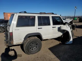 1996 Jeep Cherokee SE with VIN 1J4FJ28S0TL272778, listed as a Copart auction lot 83498634 with Not provided miles and Salvage title. Bid and sale history available at DreamBid. Image 3.