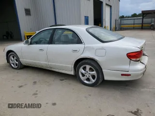 2001 Mazda Millenia z VIN JM1TA221911717066, wystawiony jako Copart lot #63341244 z przebiegiem 234 263 mil mil oraz Szkoda całkowita • Salvage title. Historia ofert i sprzedaży dostępna na DreamBid. Obrazek 2.