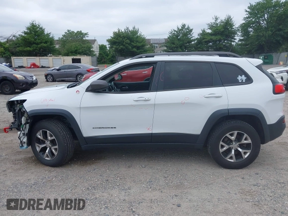 2014 Jeep Cherokee Trailhawk z VIN 1C4PJMBS4EW210719, wystawiony jako IAAI lot #42461733 z przebiegiem 134 096 mil mil oraz . Historia ofert i sprzedaży dostępna na DreamBid. Obrazek 14.